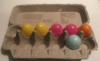 Egg Carton Pegboard with plastic eggs